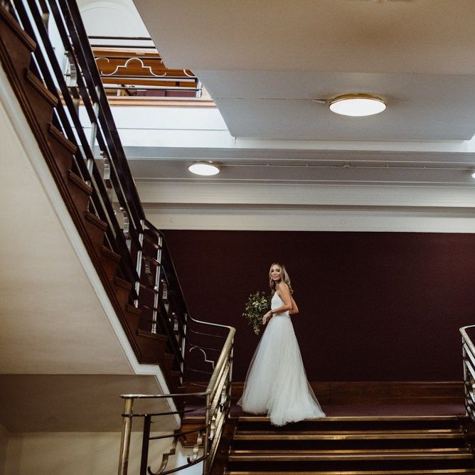 Bride wearing two piece dress at Stoke Newington Town Hall wedding