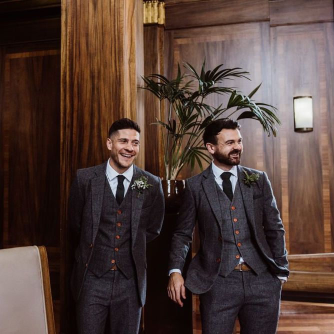 Groom and his groomsmen wearing three piece 'Peaky Blinder' style suits at Stoke Newington Town Hall