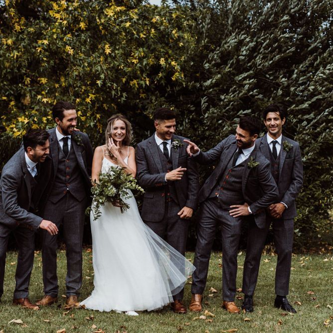 Bride and groom with their guests at 'Peaky Blinders' styled wedding