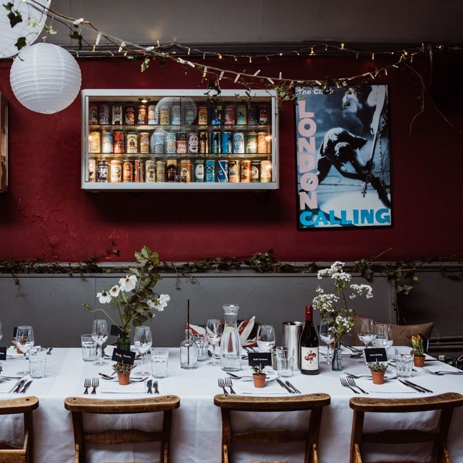 Pub reception with hanging foliage and paper lantern decor