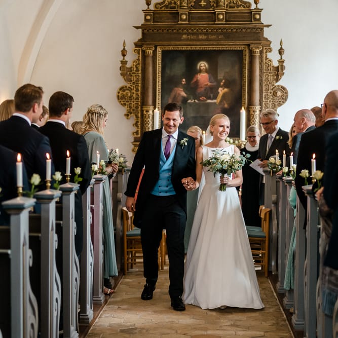 Wedding Ceremony | Bride in Caroline Castigliano Wedding Dress | Groom in Henry Herbert Tailors Morning Suit | Traditional Green/Blue Danish Wedding at Scandinavian Country House, Jomfruens Egede in Faxe, Denmark | John Barwood Photography
