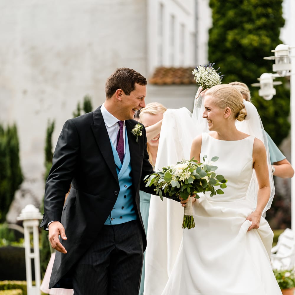 Bride in Caroline Castigliano Wedding Dress | Groom in Henry Herbert Tailors Morning Suit | Traditional Green/Blue Danish Wedding at Scandinavian Country House, Jomfruens Egede in Faxe, Denmark | John Barwood Photography