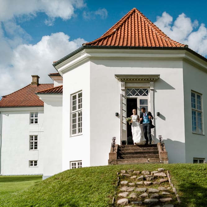 Bride in Caroline Castigliano Wedding Dress | Groom in Henry Herbert Tailors Morning Suit | Traditional Green/Blue Danish Wedding at Scandinavian Country House, Jomfruens Egede in Faxe, Denmark | John Barwood Photography