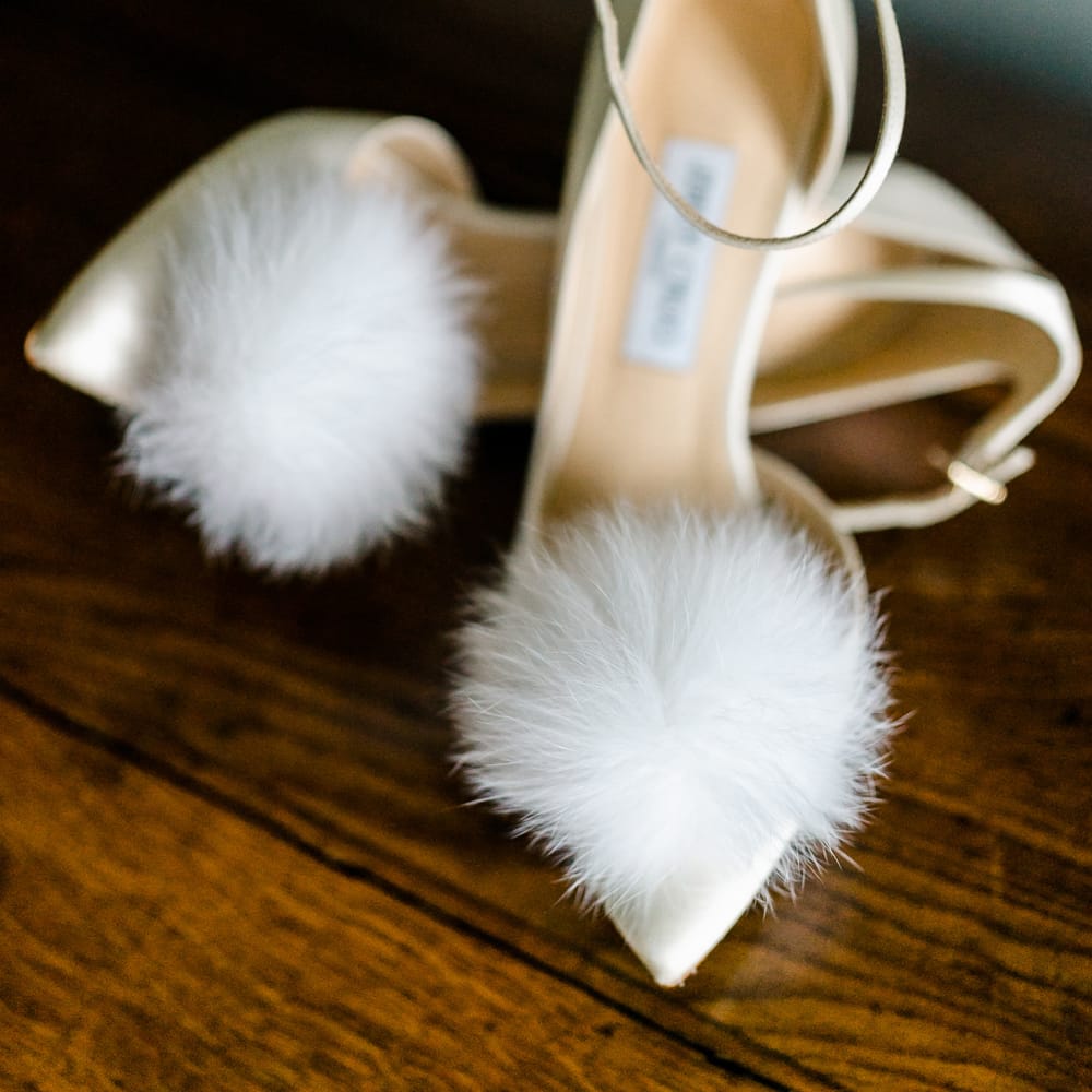 Fluffy Jimmy Choo Bridal Shoes | Traditional Green/Blue Danish Wedding at Scandinavian Country House, Jomfruens Egede in Faxe, Denmark | John Barwood Photography