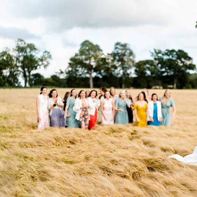 Bouquet Toss | Bride in Caroline Castigliano Wedding Dress | Traditional Green/Blue Danish Wedding at Scandinavian Country House, Jomfruens Egede in Faxe, Denmark | John Barwood Photography