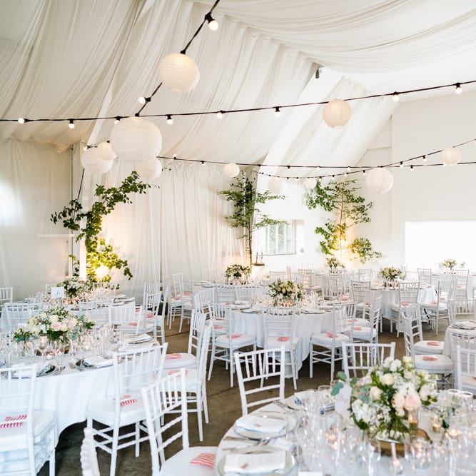 Botanical Reception with Festoon Lights &amp; Pink, White &amp; Green Flowers Wedding Decor | Traditional Green/Blue Danish Wedding at Scandinavian Country House, Jomfruens Egede in Faxe, Denmark | John Barwood Photography