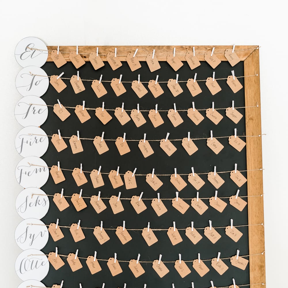Pegged Tags Escort Cards | Traditional Green/Blue Danish Wedding at Scandinavian Country House, Jomfruens Egede in Faxe, Denmark | John Barwood Photography