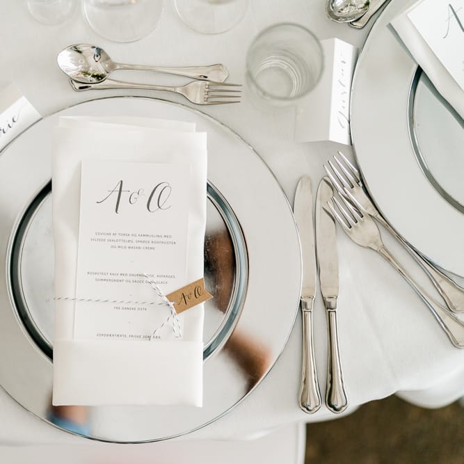 Elegant Place Setting on Silver Platter | Traditional Green/Blue Danish Wedding at Scandinavian Country House, Jomfruens Egede in Faxe, Denmark | John Barwood Photography