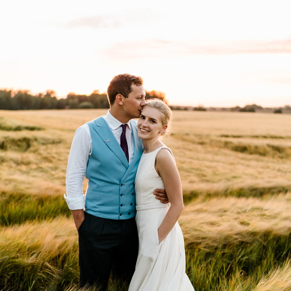 Bride in Caroline Castigliano Wedding Dress | Groom in Henry Herbert Tailors Morning Suit | Traditional Green/Blue Danish Wedding at Scandinavian Country House, Jomfruens Egede in Faxe, Denmark | John Barwood Photography