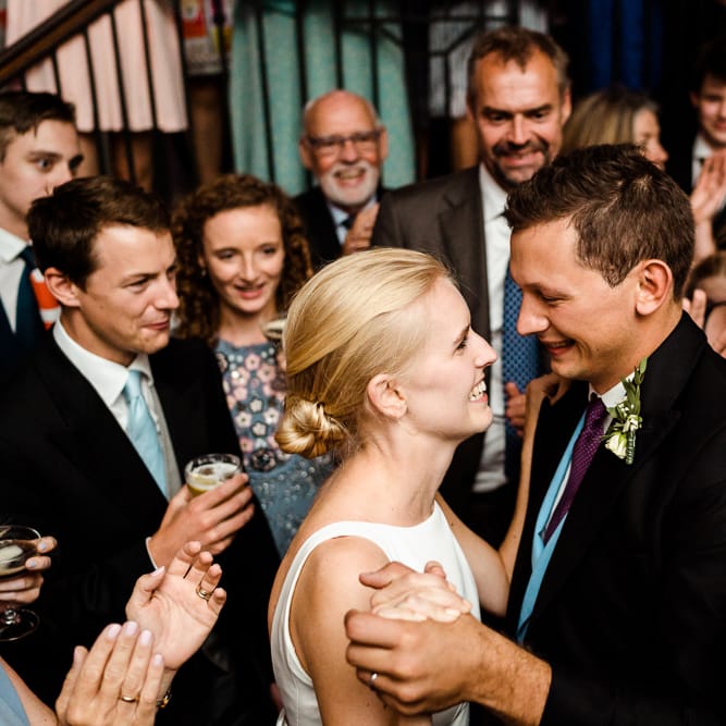 First Dance | Bride in Caroline Castigliano Wedding Dress | Groom in Henry Herbert Tailors Morning Suit | Traditional Green/Blue Danish Wedding at Scandinavian Country House, Jomfruens Egede in Faxe, Denmark | John Barwood Photography