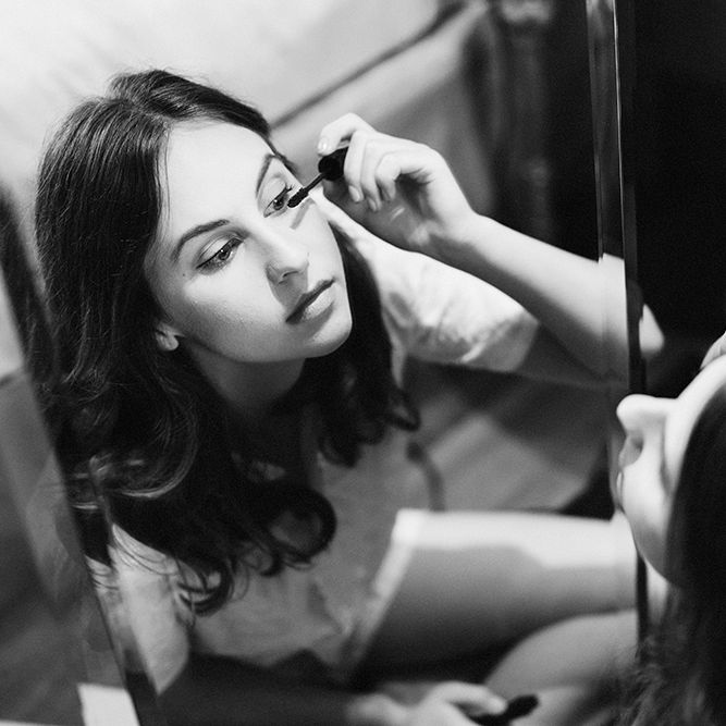 Bride doing her Own Makeup on Wedding Morning