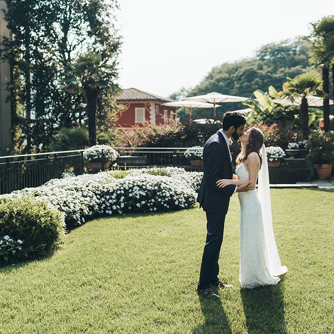 First Look with Bride in Grace Loves Lace Mia Wedding Dress and Groom in Taliare Navy Suit