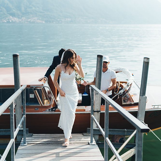 Bride in Grace Loves Lace Mia Wedding Dress Getting Off Boat