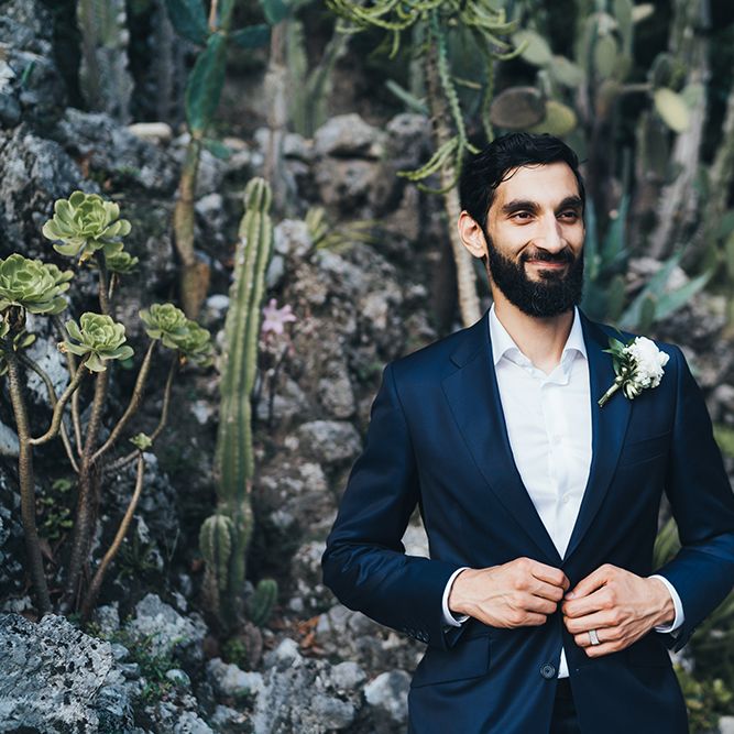 Groom in Taliare Navy Suit and White Shirt