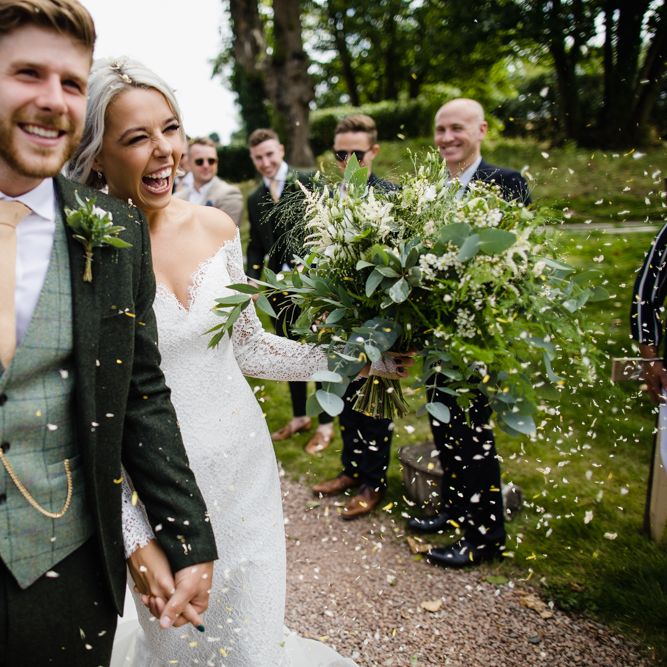Groom In Green Suit With Waistcoat // Dewsall Court Wedding With Bride In Fishtail Gown 'Adele' By Augusta Jones With Images From Chris Barber Photography And Film From Blooming Lovely Films