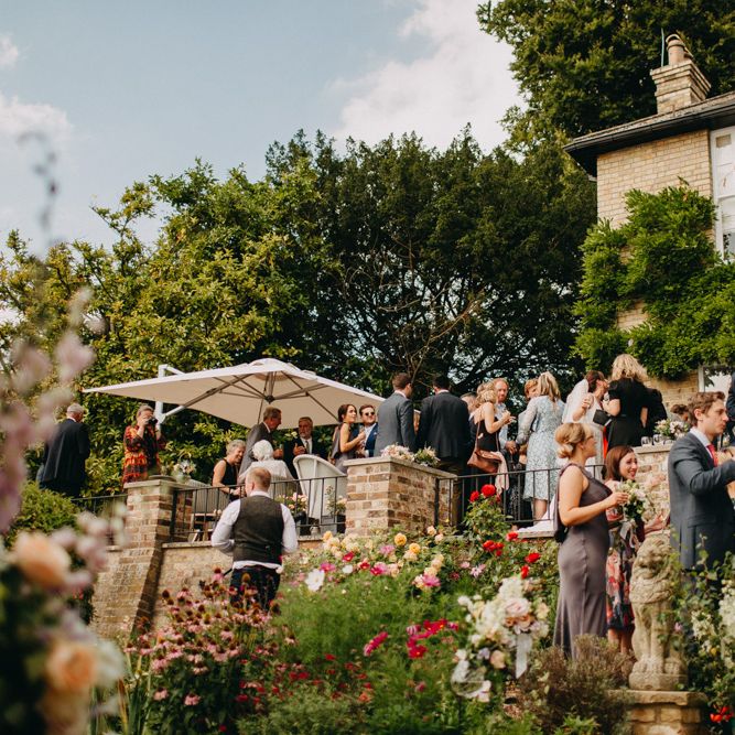 Outdoor Wedding Reception | Bride in Karen Willis Holmes | Groom in Custom Made Suit by Suit Supply | Summer Wedding at Family Home in Kent | Glass Marquee from Academy Marquees | Frances Sales Photography