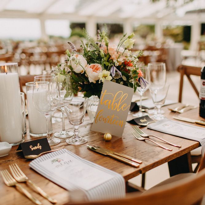 Gold lettered table Names | Hand Stitched Linen Napkins | Bride in Karen Willis Holmes | Groom in Custom Made Suit by Suit Supply | Summer Wedding at Family Home in Kent | Glass Marquee from Academy Marquees | Frances Sales Photography