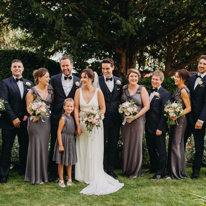 Group Shot | Flowers from Topiary Tree | Bride in Karen Willis Holmes | Groom in Custom Made Suit by Suit Supply | Summer Wedding at Family Home in Kent | Glass Marquee from Academy Marquees | Frances Sales Photography