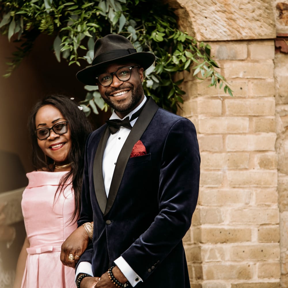 Stylish groom at the altar of The Ravenswood wedding ceremony