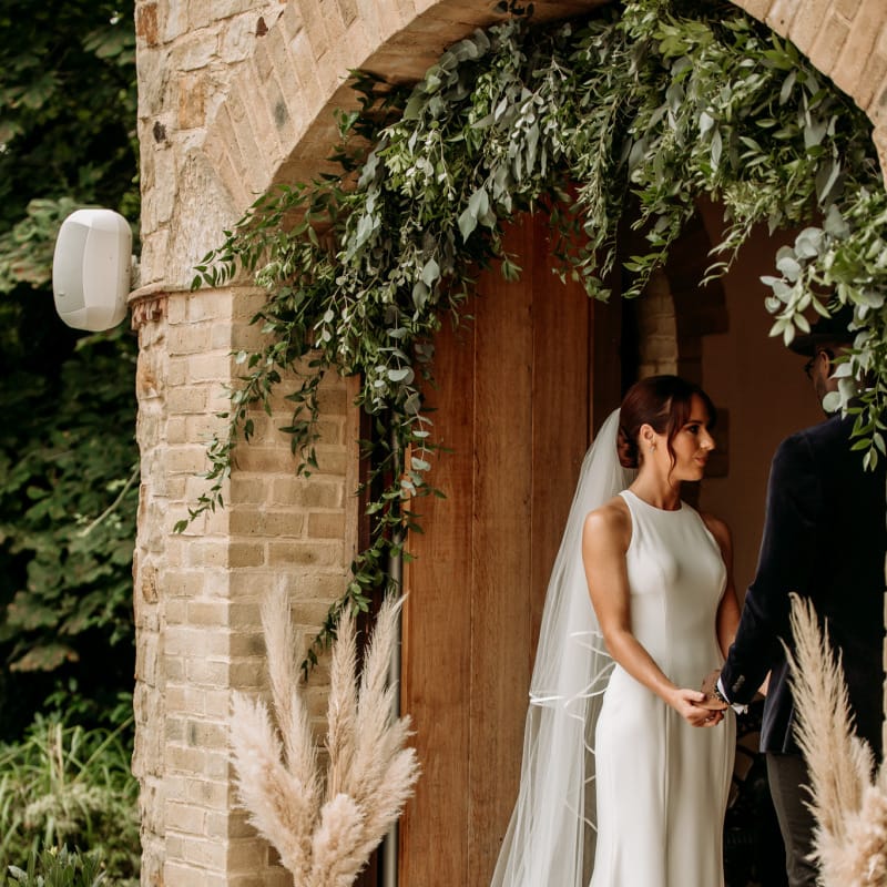 Beautiful bride in minimalist Wendy Makin wedding dress