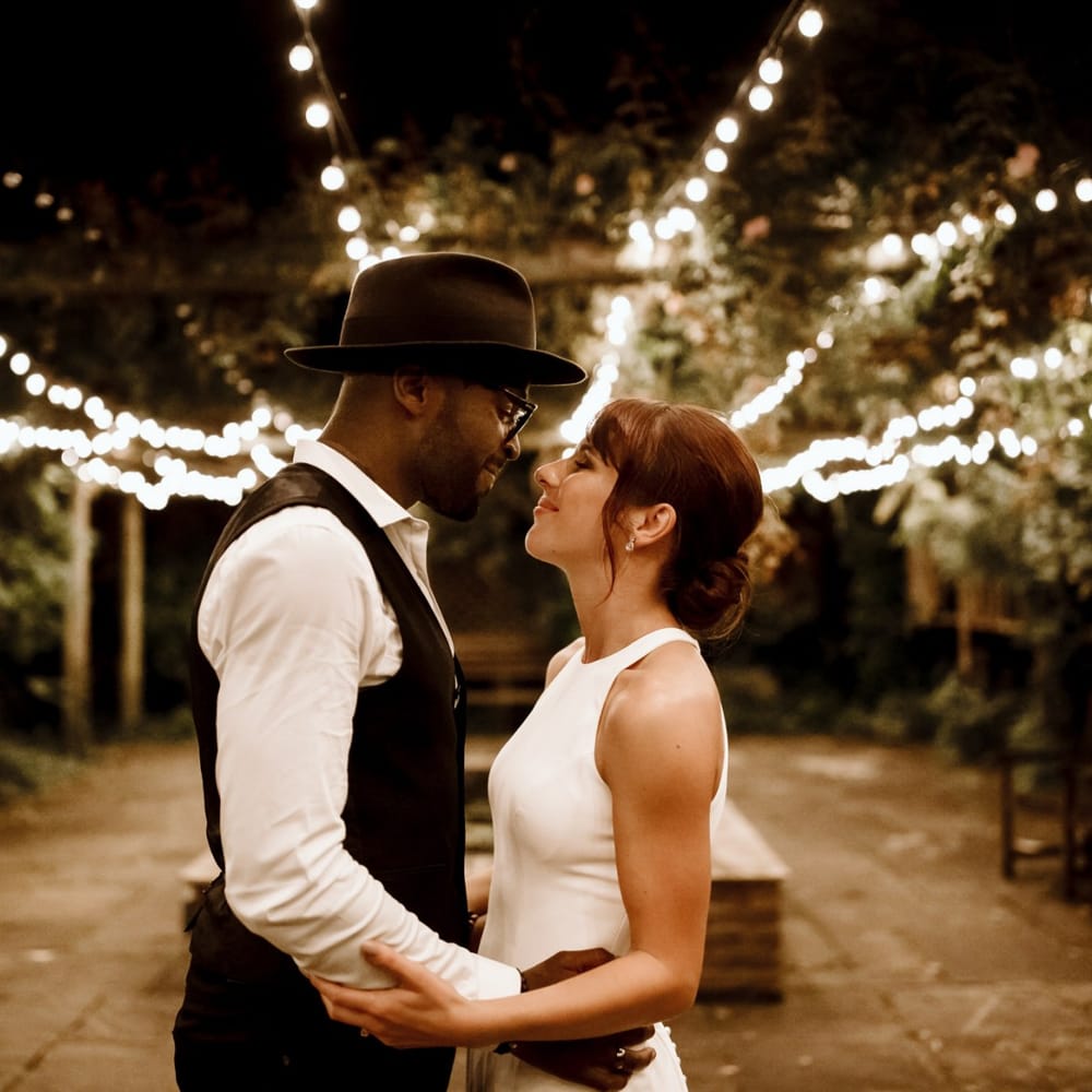 Bride and groom portrait at The Ravenswood with festoon lighting
