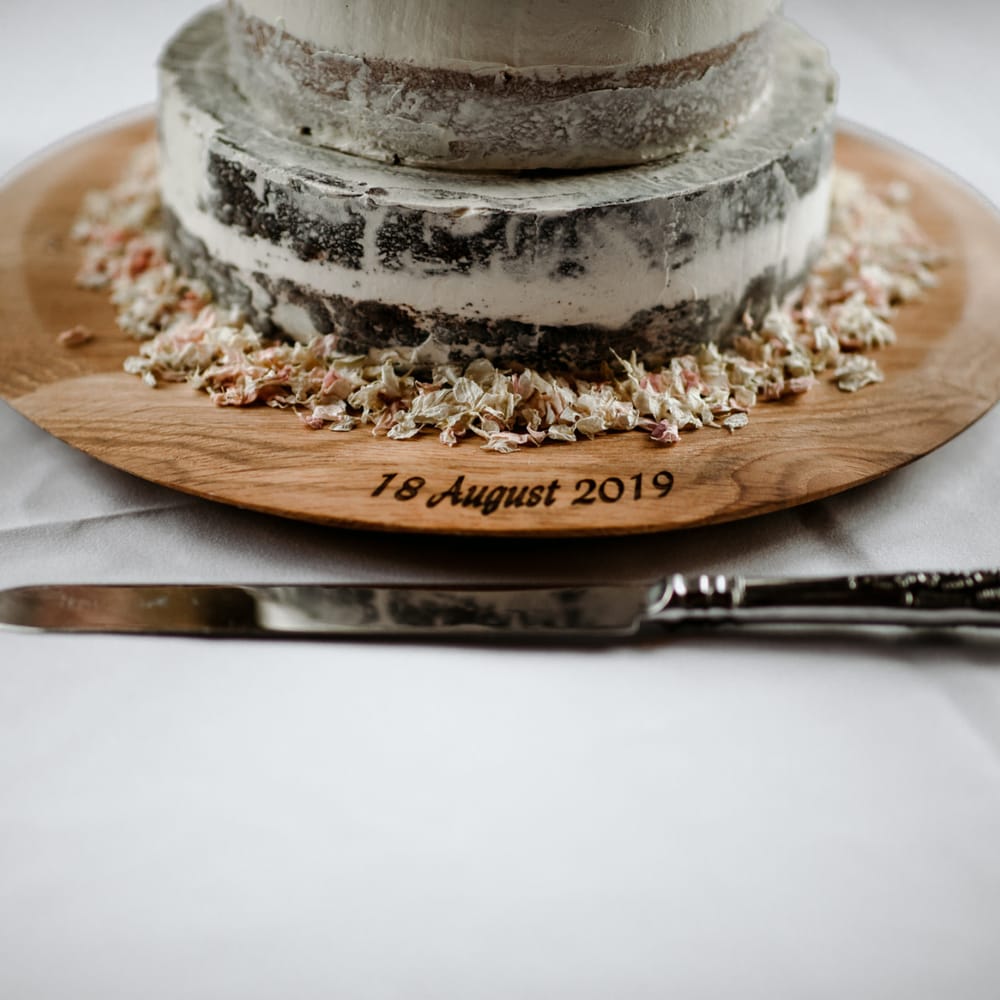 Engraved wooden cake stand