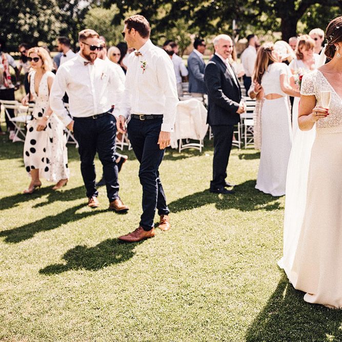Bride and Groom Drinking Champagne