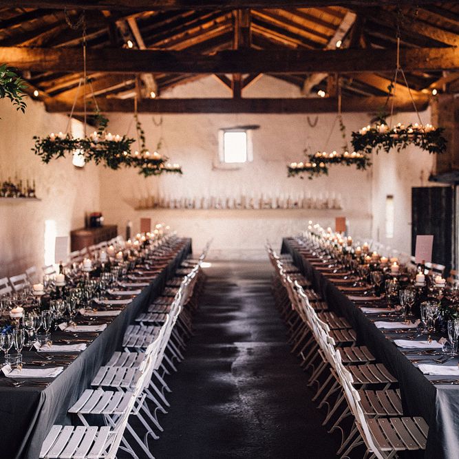 Banquet Tables with Grey Table Cloths and Floral Runners
