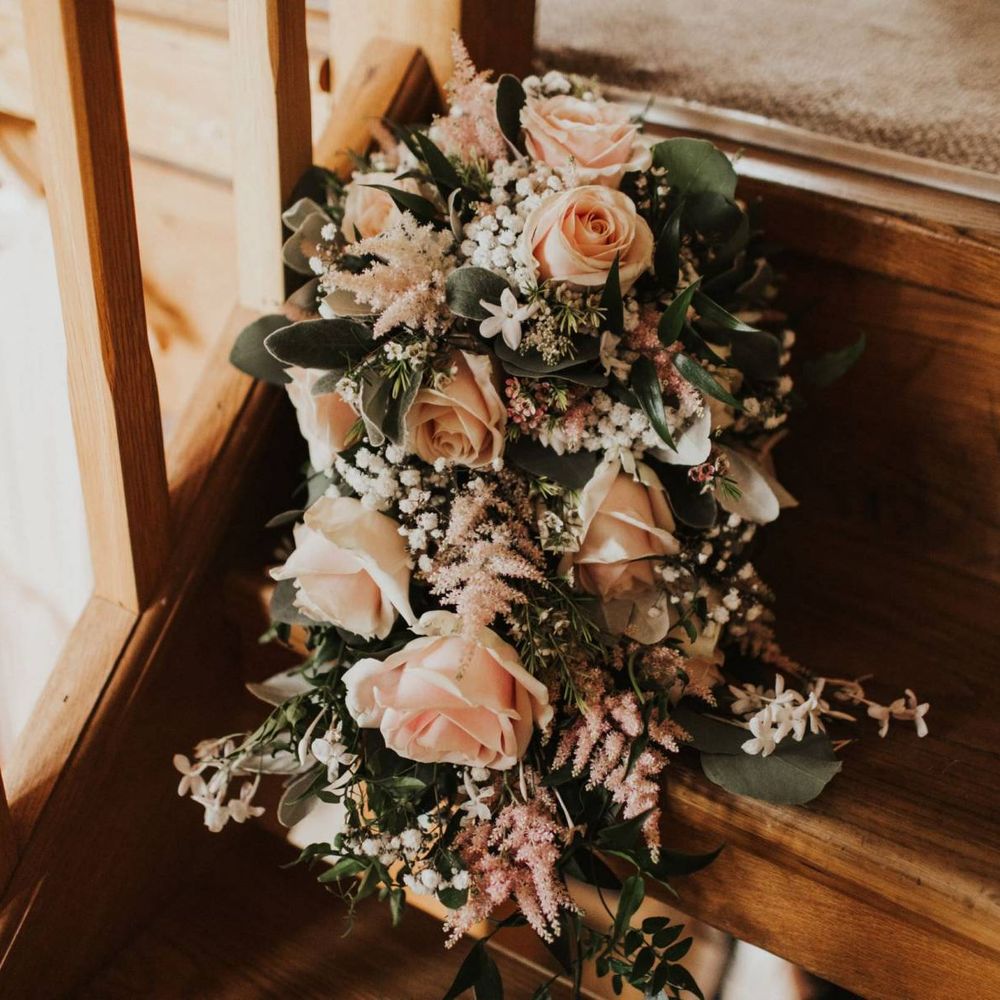 Pink rose wedding flowers for outdoor summer ceremony