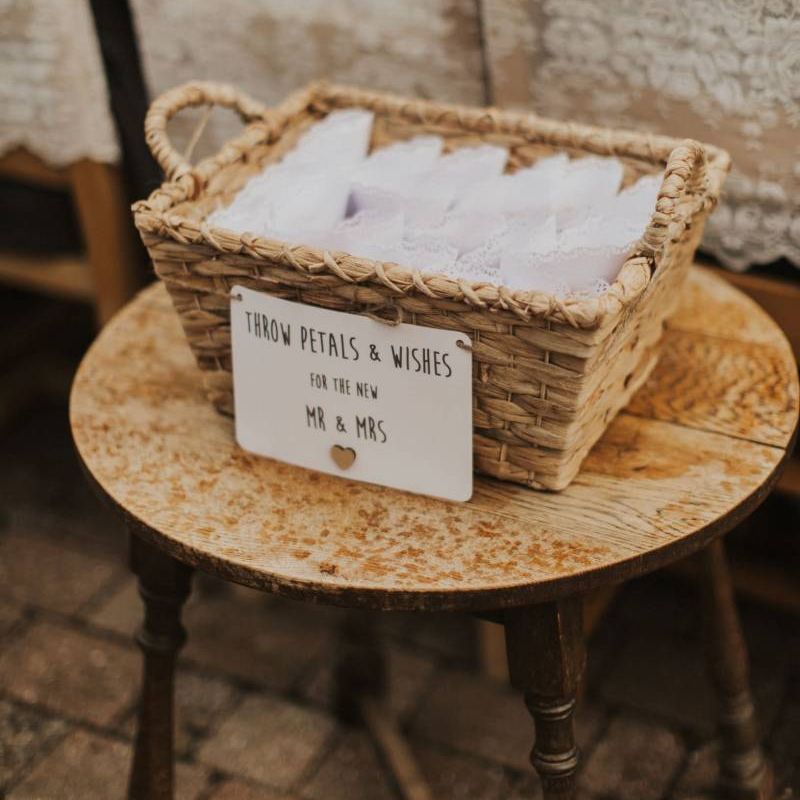 Personalised confetti basked at The Ferry House Inn for outdoor ceremony