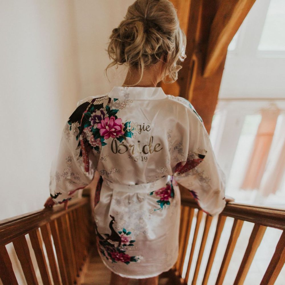 Brides personalised kaftan for summer wedding with thirteen bridesmaids