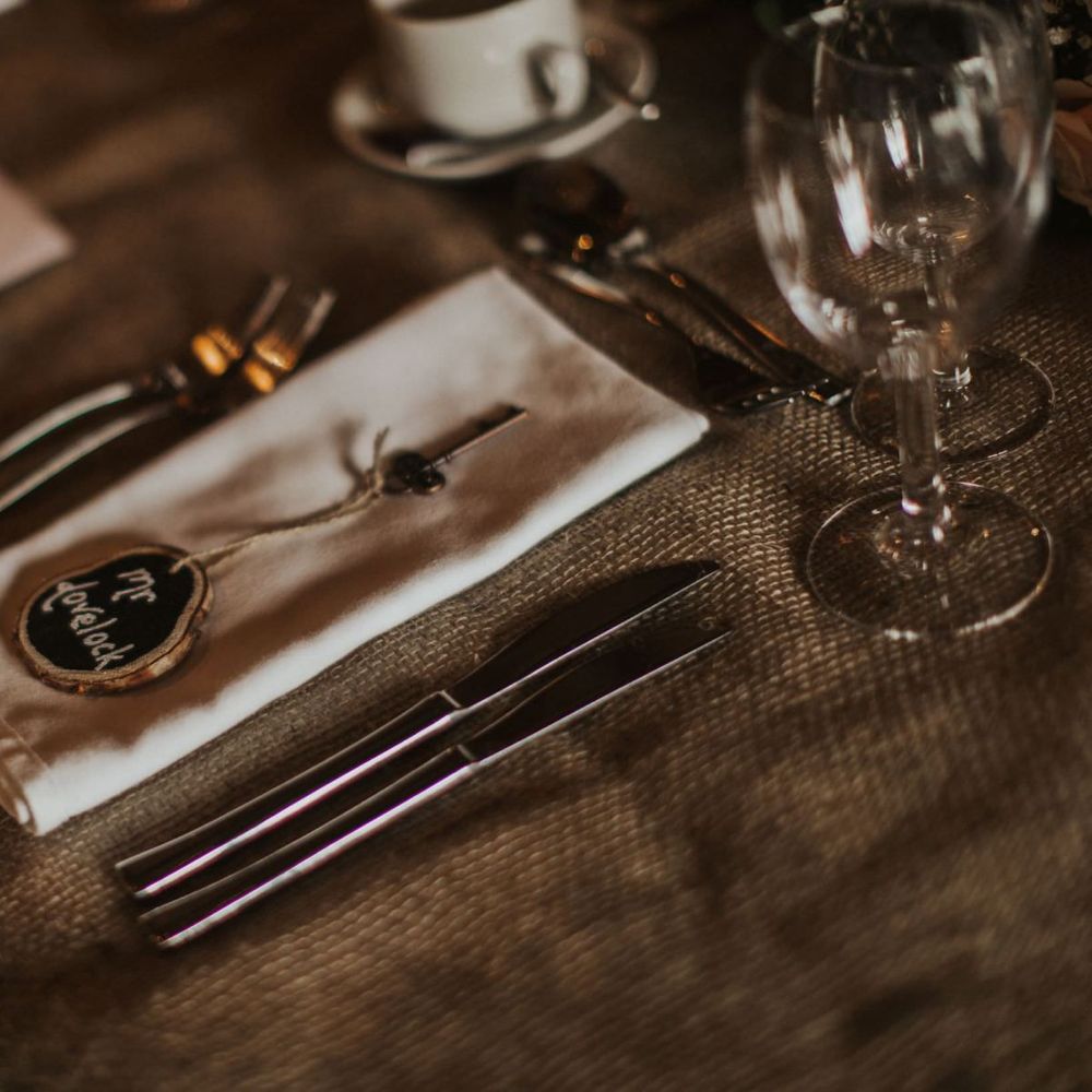 Place settings for rustic styled reception at The Ferry House Inn