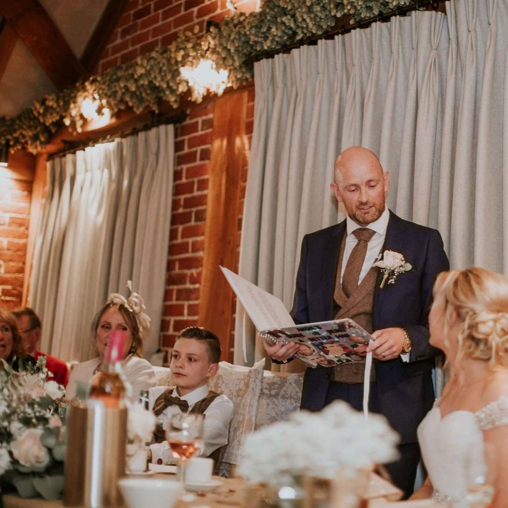 Bride and groom at The Ferry House Inn reception with rustic styling and floral decor