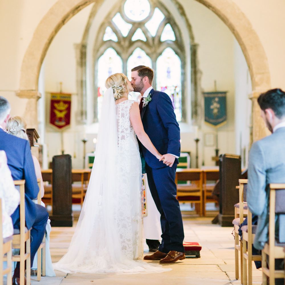 Church Wedding Ceremony | Bride in Claire Pettibone Whitney Bridal Gown with Cape | Groom in French Connection Navy Suit | DIY Country Wedding at Warborne Farm, Lymington | Camilla Arnhold Photography