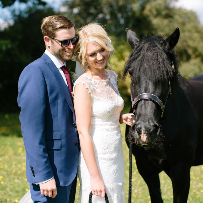 Bride in Claire Pettibone Whitney Bridal Gown with Cape | Groom in French Connection Navy Suit | DIY Country Wedding at Warborne Farm, Lymington | Camilla Arnhold Photography