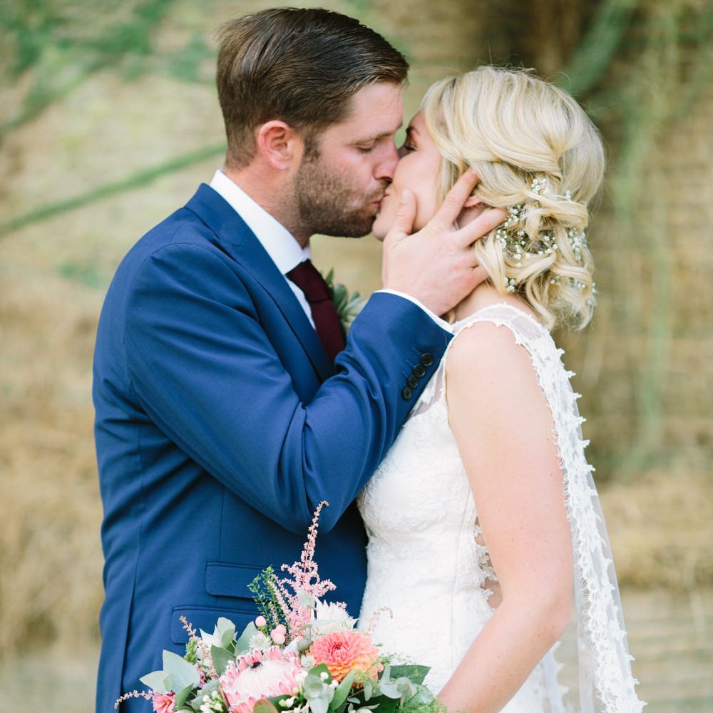 Bride in Claire Pettibone Whitney Bridal Gown with Cape | Groom in French Connection Navy Suit | DIY Country Wedding at Warborne Farm, Lymington | Camilla Arnhold Photography