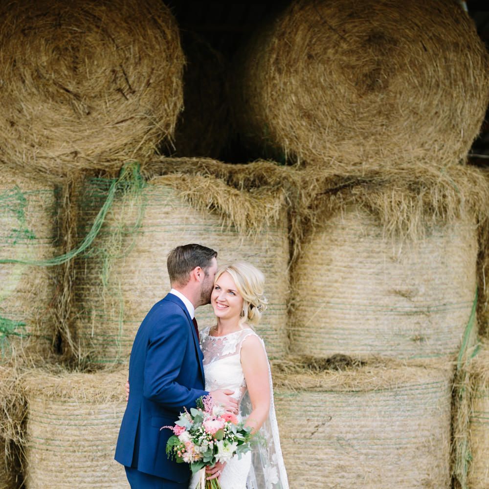 Bride in Claire Pettibone Whitney Bridal Gown with Cape | Groom in French Connection Navy Suit | DIY Country Wedding at Warborne Farm, Lymington | Camilla Arnhold Photography