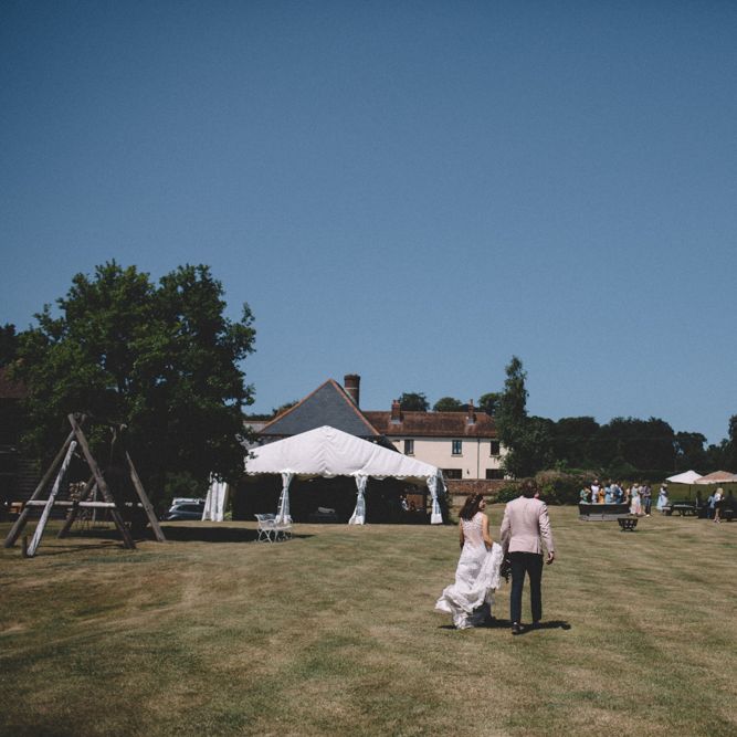 Groom In Pink Jacket // Image By Carrie Lavers Photography
