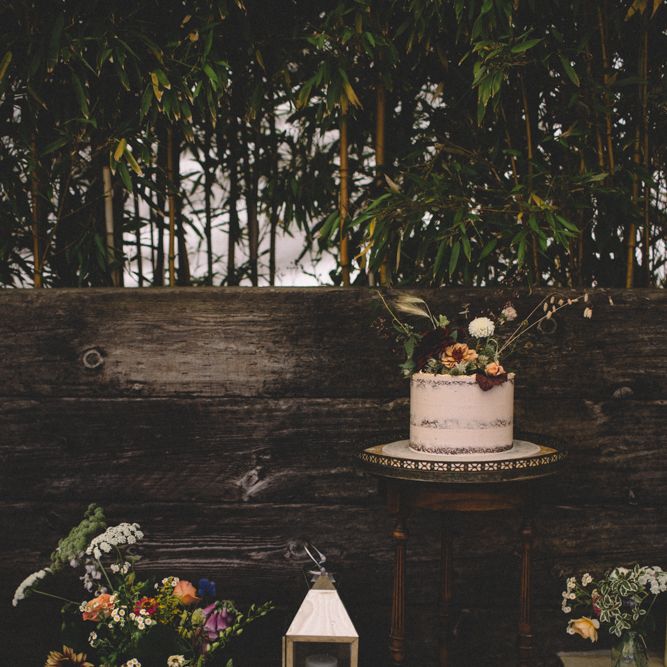 Semi Naked Wedding Cake // Groom In Pink Jacket // Image By Carrie Lavers Photography