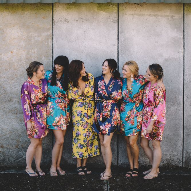 Bride In Bridesmaids In Floral Robe For Getting Ready // Image By Carrie Lavers Photography