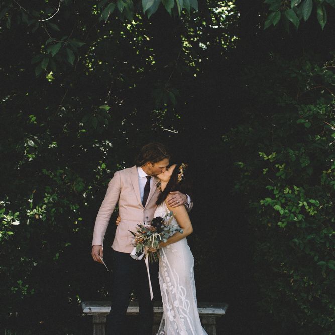 Groom In Pink Jacket For BBQ Wedding On Family Farm Planned In Just 6 Weeks // Images By Carrie Lavers Photography // Bride In Vintage Lace Jane Bourvis Gown
