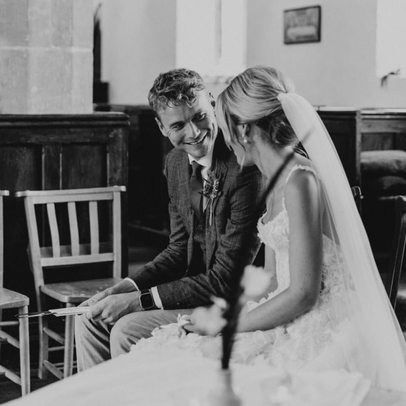 Intimate moment of the bride and groom at the church wedding