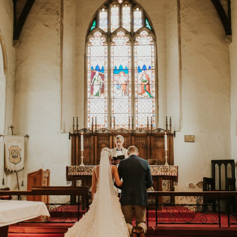 Bride and groom at the altar of their church wedding ceremony