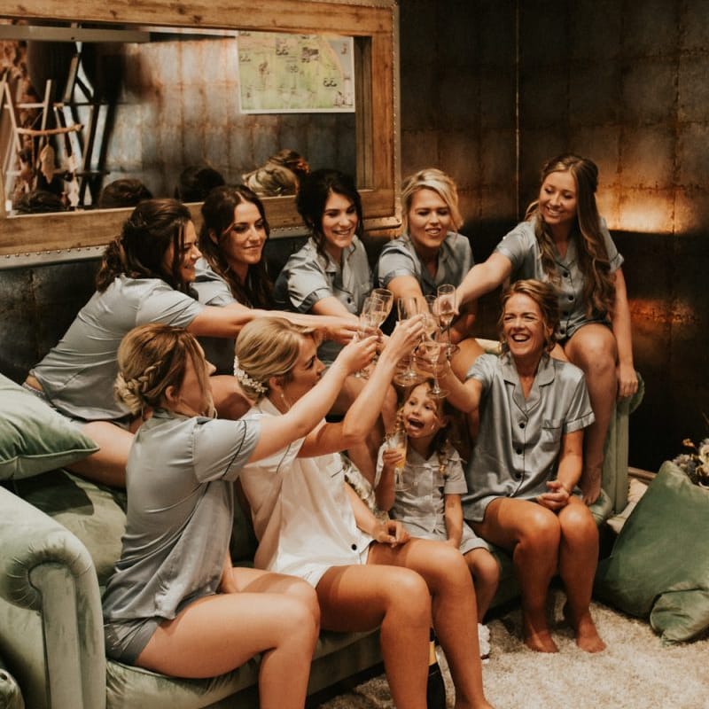 Wedding morning bridal party preparations with matching getting ready robes