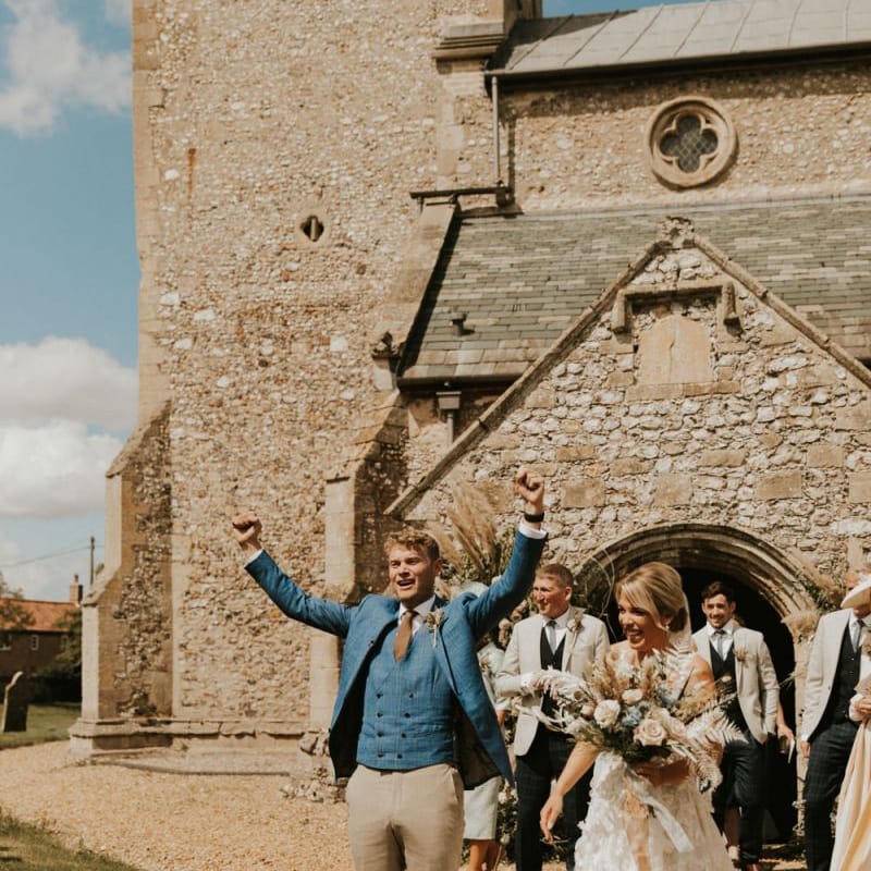 Bride and groom outside the church
