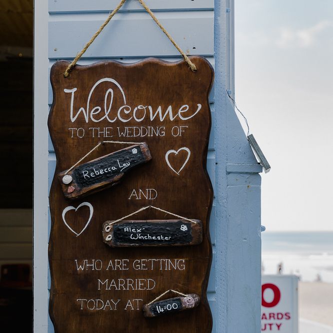 Wooden Welcome Sign | Lusty Glaze Beach Wedding Newquay Cornwall | Alexa Poppe Photography