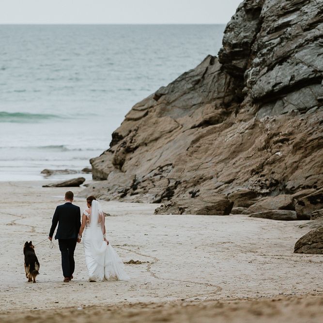 Coastal Portrait | Bride in Lace Long Sleeve Martina Liana Wedding Dress | Groom in Navy Three-piece Suit | Lusty Glaze Beach Wedding Newquay Cornwall | Alexa Poppe PhotographyLusty Glaze Beach Wedding Newquay Cornwall | Alexa Poppe Photography