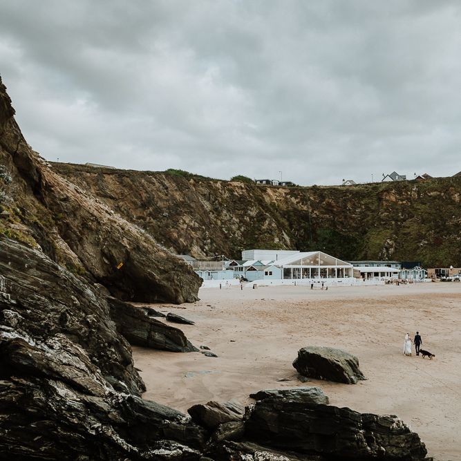 Coastal Portrait | Bride in Lace Long Sleeve Martina Liana Wedding Dress | Groom in Navy Three-piece Suit | Lusty Glaze Beach Wedding Newquay Cornwall | Alexa Poppe PhotographyLusty Glaze Beach Wedding Newquay Cornwall | Alexa Poppe Photography