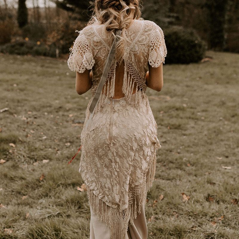 Boho Lace Wedding Dress with Open Back and Fringe Detail