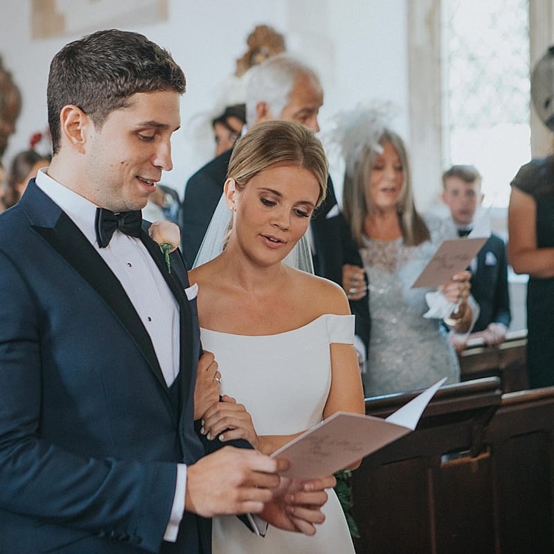 Church Wedding Ceremony | Bride in Suzanne Neville Bardot Nouveau Wedding Dress | Groom in Black Tie | Pastel Pink &amp; Mint Green Wedding at Granary Estates Suffolk | Julia &amp; You Photography